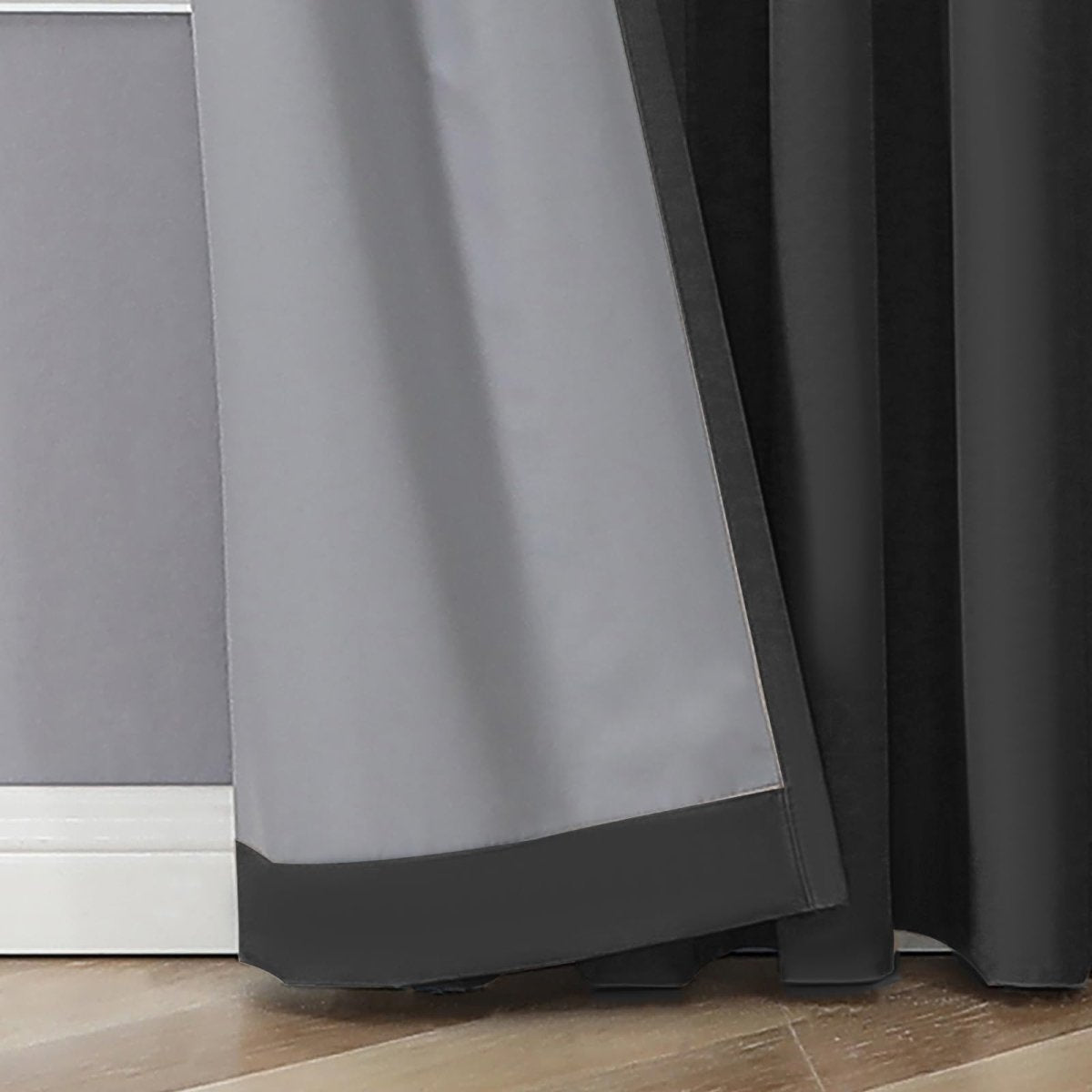 Joydeco black faux linen blackout curtain showing double-layer fabric and grey liner for room darkening.