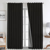 Joydeco black 100% blackout linen curtains with grommet tops, thermal insulated, on a silver rod in a bedroom setting.
