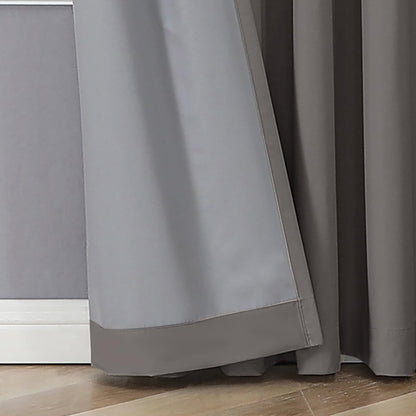 Close up of Joydeco grey blackout curtain panels showing smooth fabric texture and light blocking lining.
