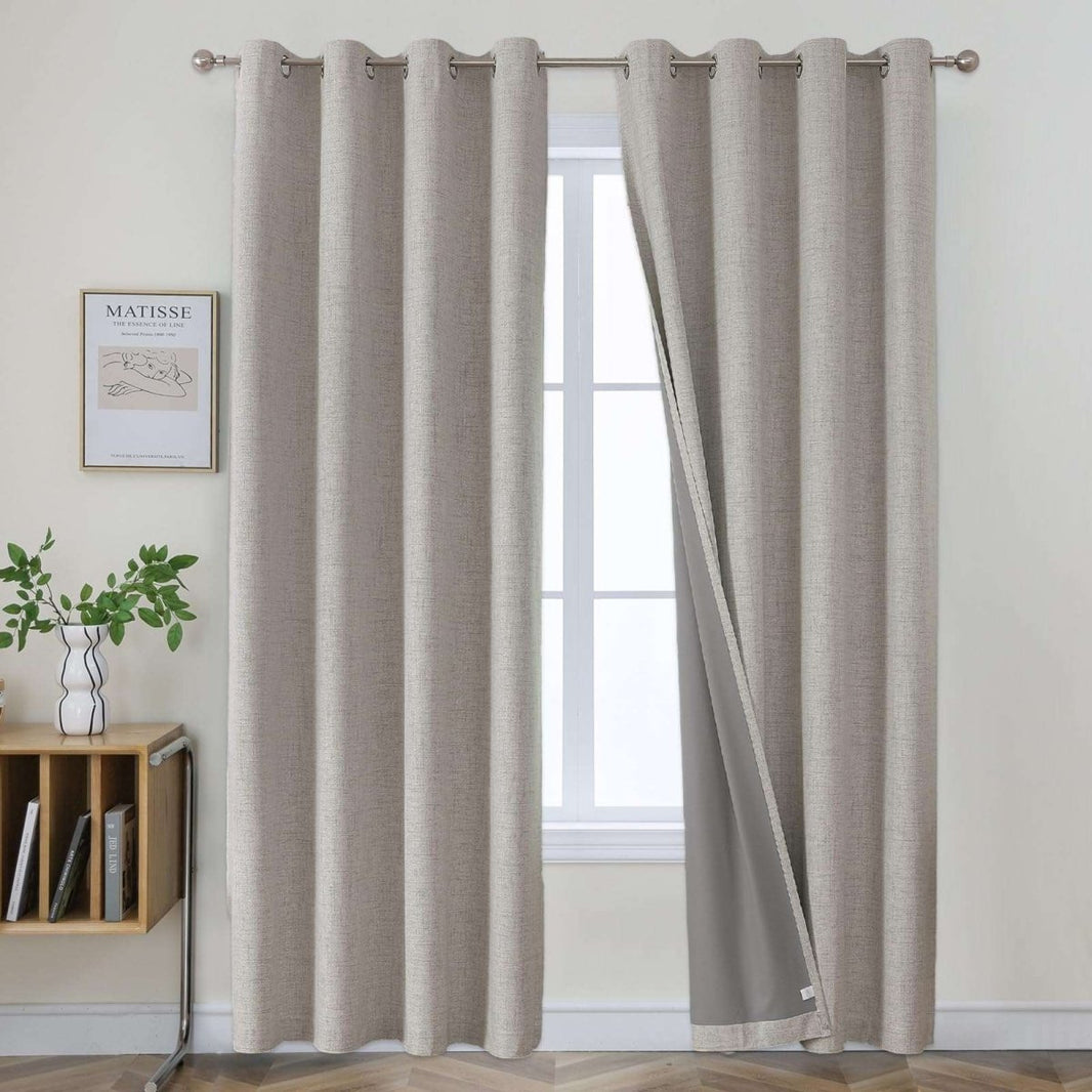 Joydeco beige faux linen blackout curtains with grommets, showcasing texture and dual-layer design.