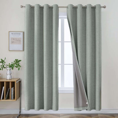 Two sage green textured linen blackout curtain panels with grommet tops, showcasing 100% blackout feature.
