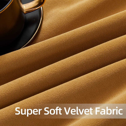 Close-up of soft mustard yellow velvet fabric texture, draped elegantly. Showcases luxurious material quality.