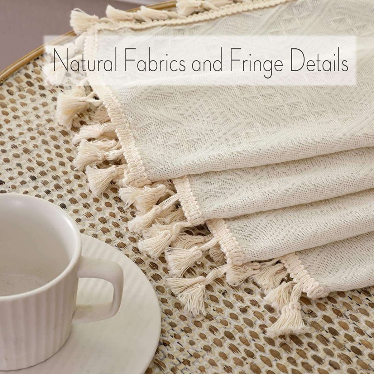 Close-up of Joydeco beige boho linen curtains showcasing diamond weave texture and cream tassels on folded edges.