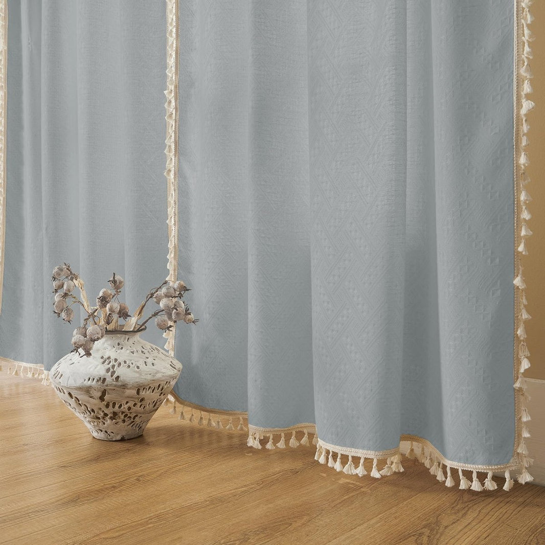 Joydeco Stone Blue linen sheer curtains with textured pattern and cream tassel trim, light filtering farmhouse style.