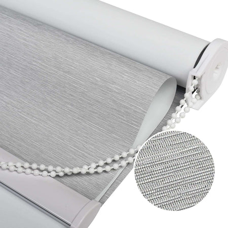 Close-up of Joydeco light grey roller shade with 100% blackout Striped Jacquard fabric texture and white beaded chain.