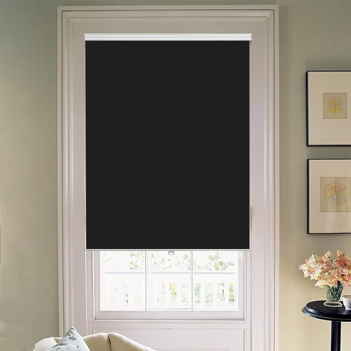 Joydeco Black Cordless Blackout Roller Shade with Aluminum Bottom Rod in White Trimmed Window.