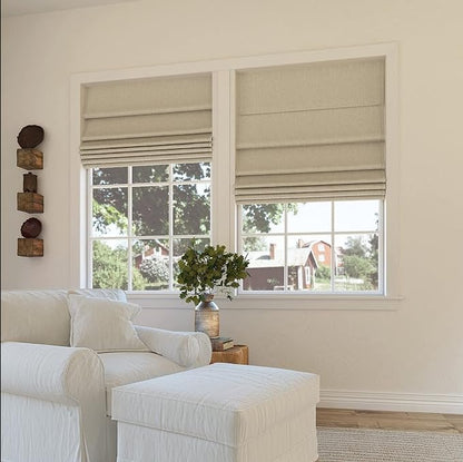 Joydeco beige blackout Roman shades in living room, partially drawn to show sunny outdoor view.