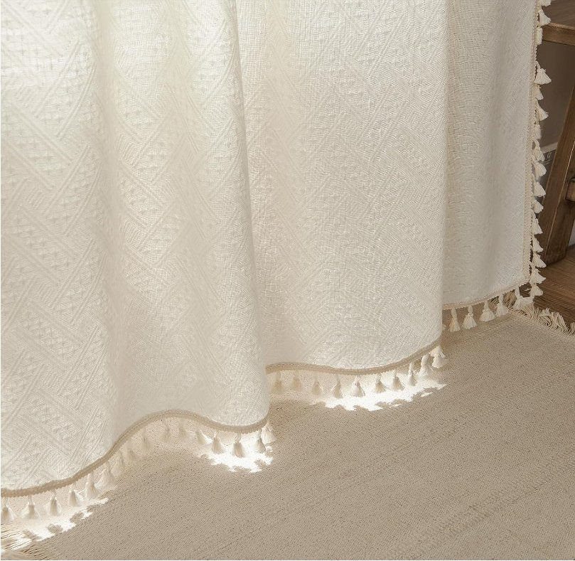 Joydeco cream linen boho curtains with diamond texture and tassel fringe, 108 inches long.