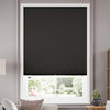 Joydeco dark charcoal cordless blackout cellular shade lowered on window, showcasing pleats and light blocking.