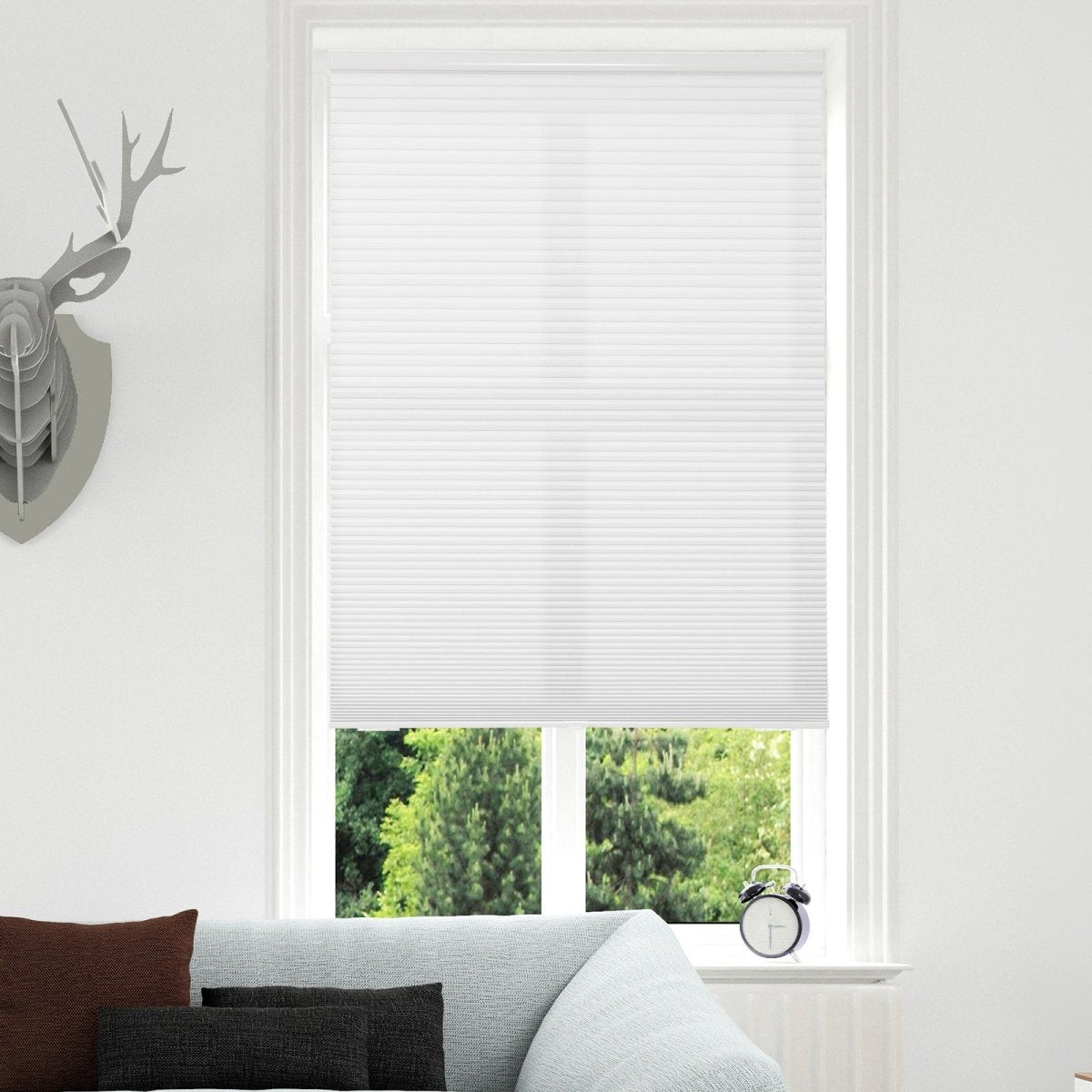 Joydeco white cordless cellular shade with honeycomb texture in a modern living room window, light filtering.