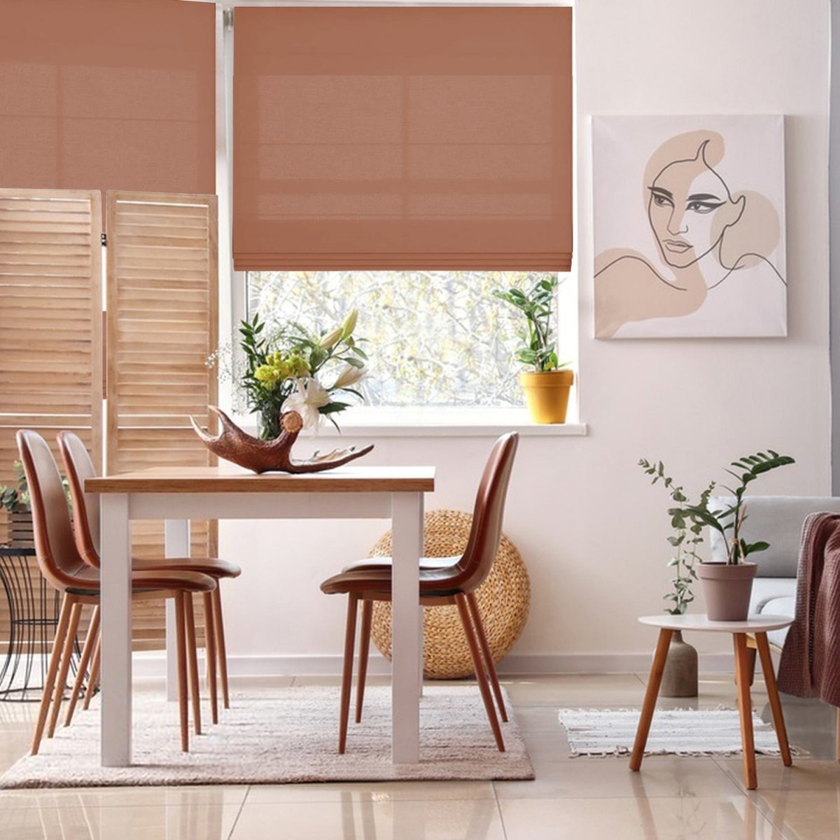 Joydeco warm linen blend Roman shade filters light in a dining room with wooden table and chairs.