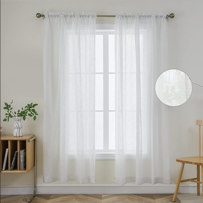 Joydeco custom white sheer curtains with linen-like texture and rod pocket, filtering daylight in a minimalist room.