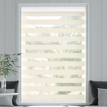 Joydeco cream light filtering cordless dual zebra shade with alternating sheer and opaque bands on a window.