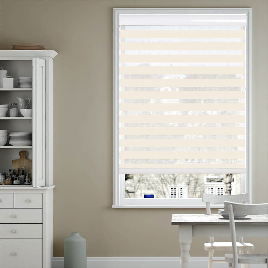 Joydeco cream dual shade with sheer & opaque stripes on window. Light filtering.