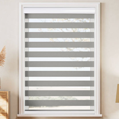 Joydeco gray and white light filtering dual shades with alternating sheer and opaque stripes installed on a window.