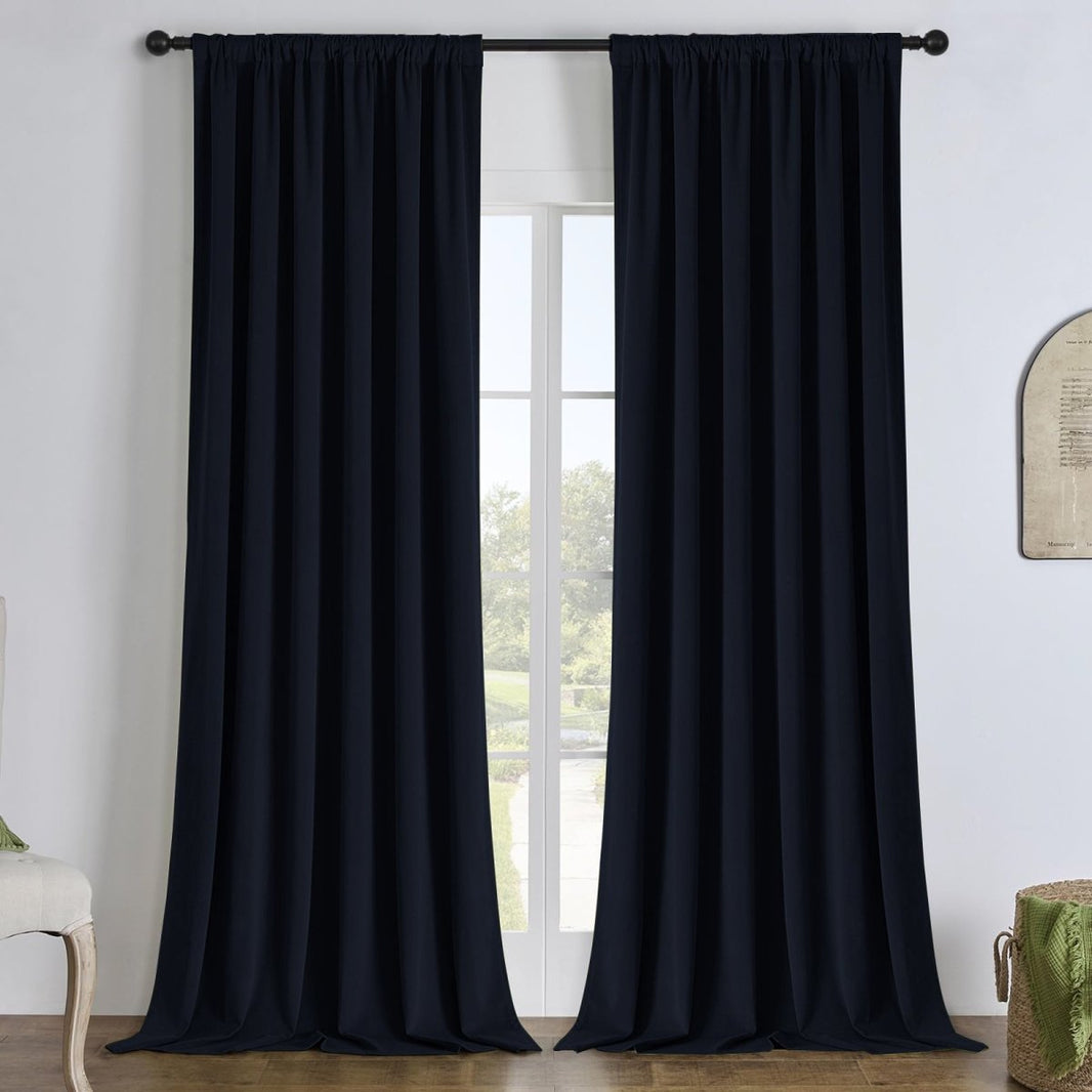Black Joydeco custom velvet blackout curtains, elegant, floor-length.
