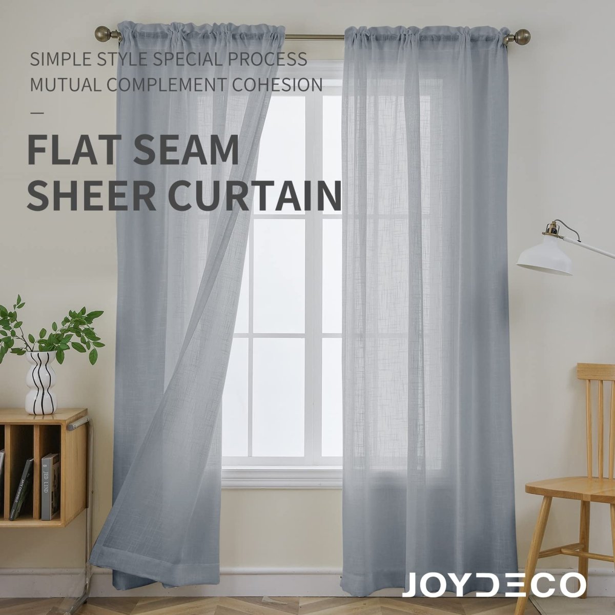 Joydeco grey faux linen floral embroidered sheer curtains with rod pocket, draped on window to show light filtering.