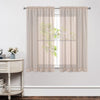 Beige floral embroidery linen-blend sheer curtains, rod pocket, filtering light in a bright living room.