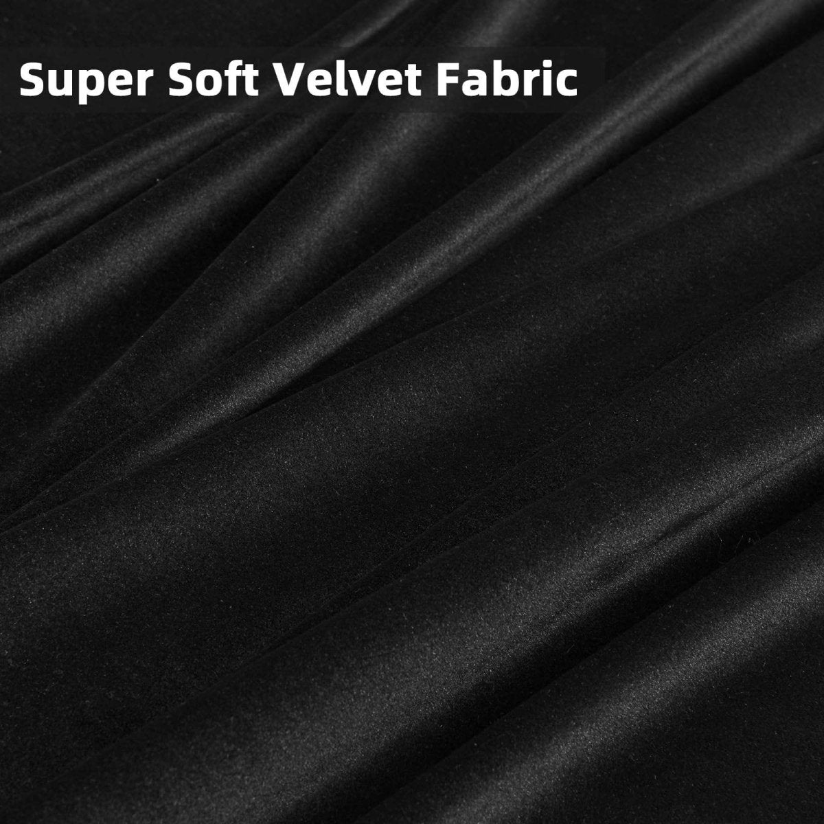 Close up of luxurious black velvet fabric showing soft texture and sheen. Joydeco blackout curtains.
