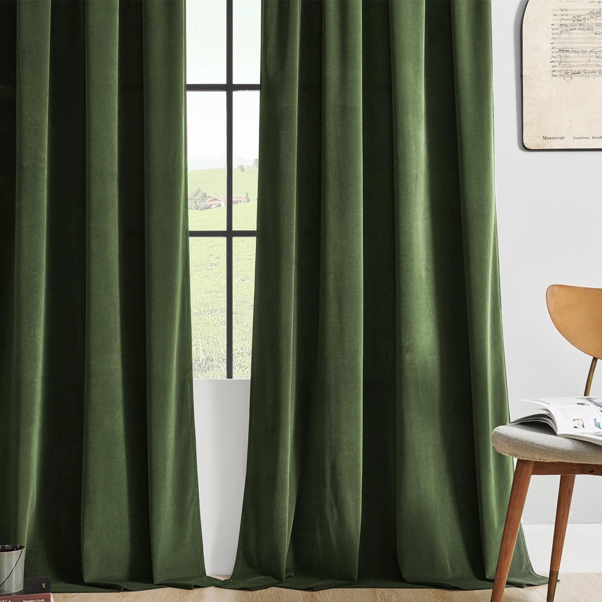 Joydeco olive green velvet blackout curtains. Soft, thermal insulated, rod pocket design shown hanging. Ideal for bedroom.