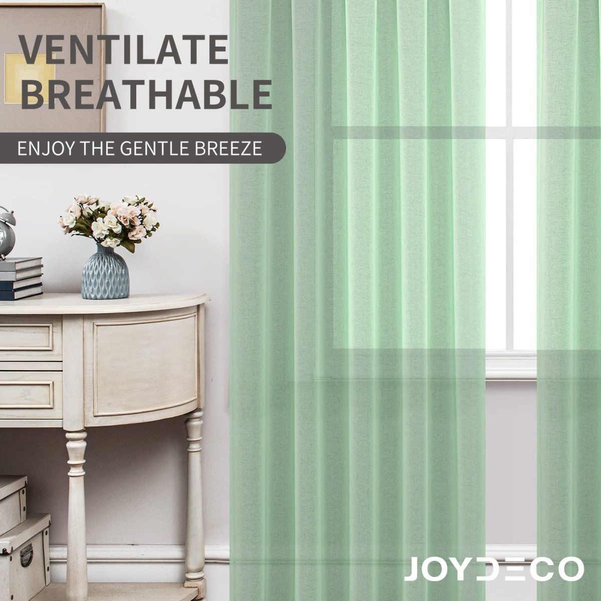 Joydeco mint green sheer curtains with vertical pleats by a window, light & breathable.