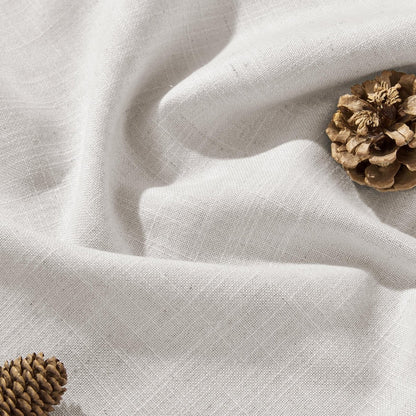 Joydeco Blanc De Blanc white blackout linen curtain fabric with natural texture.