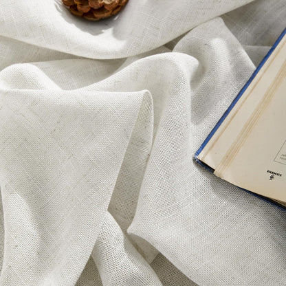 Joydeco white semi-sheer linen blend pinch pleated curtain fabric texture close-up with soft folds.