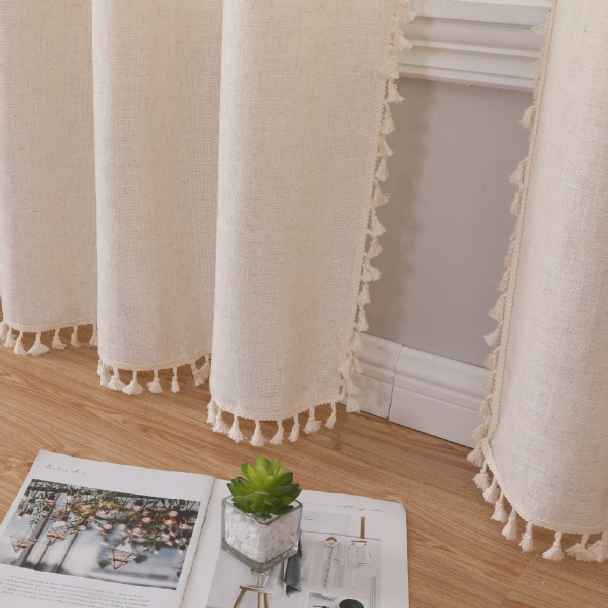 Joydeco beige linen curtains with natural texture and tassel trim, light filtering, shown in room setting.