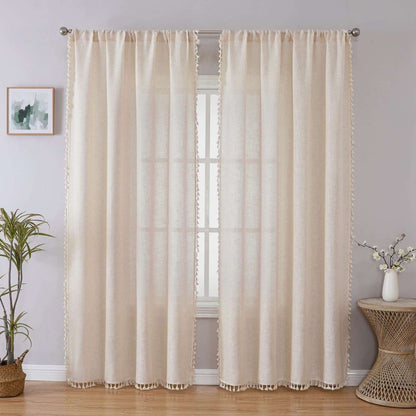 Joydeco beige boho linen curtains with tassel trim and embroidery, displayed in a room setting.