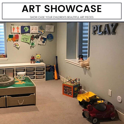 Joydeco stainless steel wire rod displaying children's art in a playroom with toys and storage.