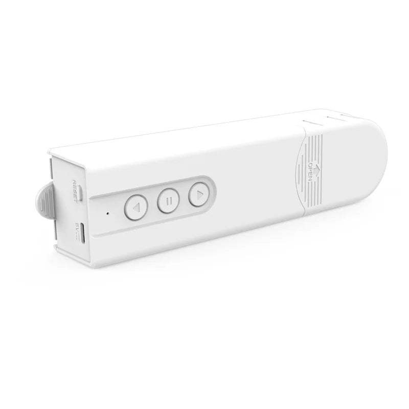 White Joydeco smart blind motor with up, stop, down buttons and USB port.