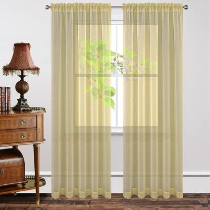 Yellow sheer rod pocket curtains with diamond embroidery, allowing light while maintaining privacy.